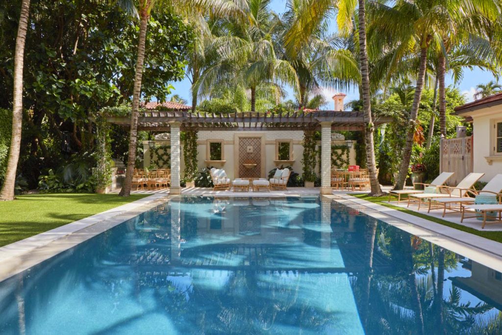 Mediterranean Revival Palm Beach Villa with Tropical Theme