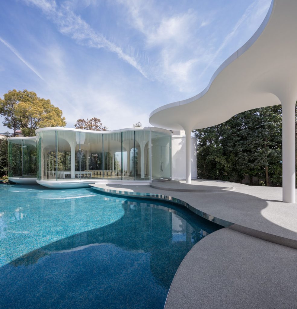 Minimalist Curved Glass Cloud of Luster Wedding Chapel in Japan ...