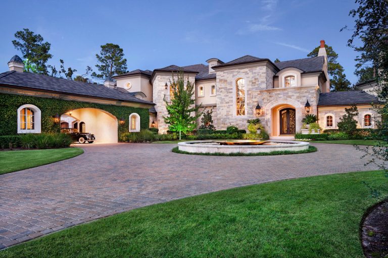 French Inspired Stone Mansion with Carriage House