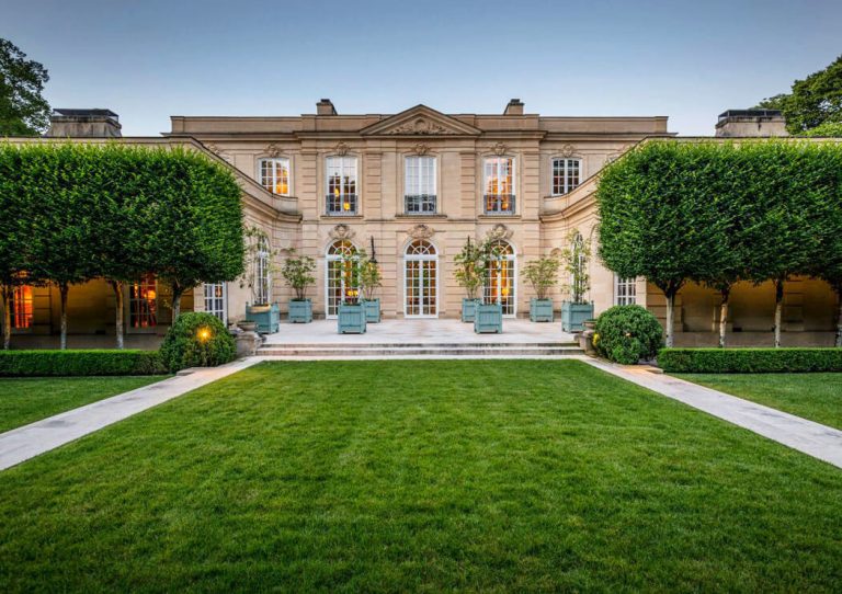 Neoclassical Mansion Surrounded by Beautifully Manicured Gardens