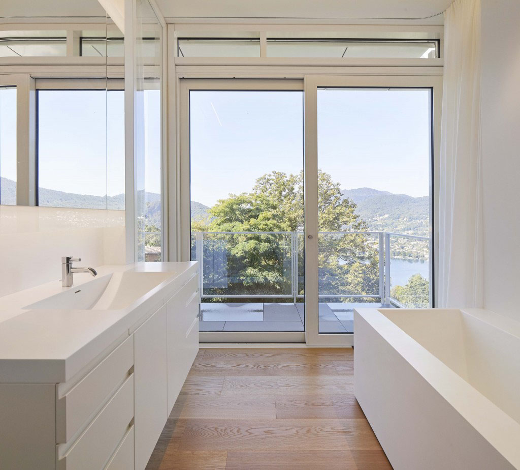 A Modern Hillside Residence Overlooking Lake Lugano | iDesignArch ...