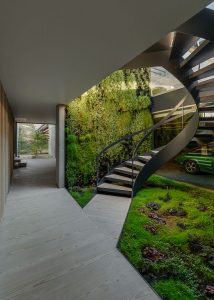 Modern-Concrete-House-with-Spiral-Staircase-and-Two-Outdoor-Pools-Portugal_1