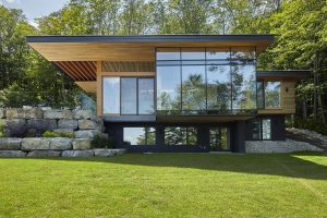 Modern Lakeside Cottage with Douglas Fir Wood Ceilings and Large Roof ...