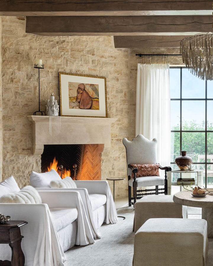 Rustic Living Room with Stone Walls and Ceiling Beams