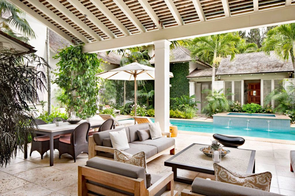 Coastal Home with Anglo-Caribbean Style Tropical Architecture